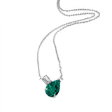 Deltora Diamonds Emerald Necklace with Emerald Cut Diamond Accent.