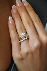 Deltora Diamonds Floating East West Oval Cigar Band Engagement Ring made with Sustainable Lab Diamonds.