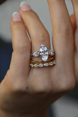 Deltora Diamonds Marquise Cut with pear side stones engagement ring setting.